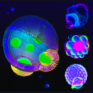 Brightly colored spheres against a dark background. 